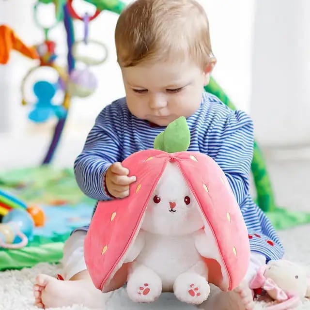 Reversible pink Strawberry Floppy Ear Bunny stuffed toy with zipper.