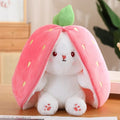 Reversible pink Strawberry Floppy Ear Bunny stuffed toy with zipper.